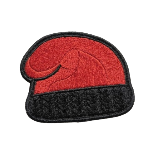 Embroidered patch of a red Catalan barretina